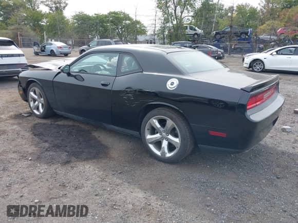 2013 Dodge Challenger R/T z VIN 2C3CDYBT7DH605131, wystawiony jako IAAI lot #43284430 z przebiegiem 55 656 mil mil oraz . Historia ofert i sprzedaży dostępna na DreamBid. Obrazek 3.