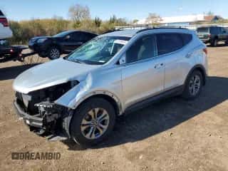 2016 Hyundai Santa Fe z VIN 5XYZU3LB7GG330894, wystawiony jako Copart lot #87209335 z przebiegiem 123 680 mil mil oraz Szkoda całkowita • Salvage title. Historia ofert i sprzedaży dostępna na DreamBid. Obrazek 1.