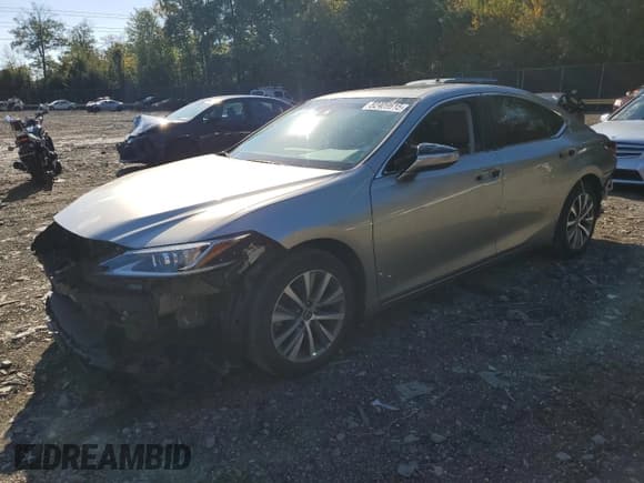 ✅ 2021 Lexus ES 250 • VIN: 58AD11D12MU004951 • Lot: 82409615. Wystawiony na Copart z przebiegiem 86 827 mil. Bezpłatny archiwum sprzedaży aukcyjnych z USA i szczegółowy raport historii pojazdu na DreamBid. Zdjęcie 1.