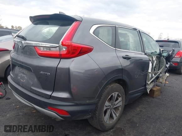 ✅ 2018 Honda CR-V LX • VIN: 2HKRW6H37JH225575 • Lot: 43583321. Listed on IAAI with 185,932 mi. Free auction sales archive from the USA and detailed vehicle history report at DreamBid. Image 4.