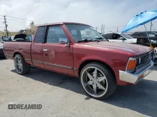 ✅ 1986 Nissan 720 • VIN: JN6ND06S4GW111559 • Lot: 53158565. Wystawiony na Copart z przebiegiem 186 515 mil. Bezpłatny archiwum sprzedaży aukcyjnych z USA i szczegółowy raport historii pojazdu na DreamBid. Zdjęcie 4.