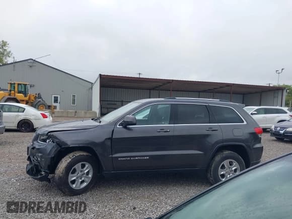 ✅ 2015 Jeep Grand Cherokee Laredo • VIN: 1C4RJFAGXFC171154 • Лот: 43286818. Опубликован ранее на IAAI с пробегом 136 453 миль. Бесплатный доступ к архиву аукционных продаж из США и подробный отчёт об истории автомобиля на DreamBid. Изображение 14.