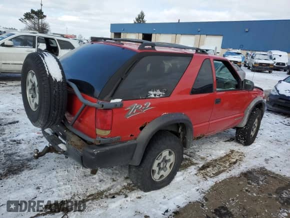 2003 Chevrolet Blazer LS with VIN 1GNCT18X43K106639, listed as a Copart auction lot 88293295 with Not provided miles and Clean title. Bid and sale history available at DreamBid. Image 3.
