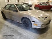 ✅ 2001 Pontiac Sunfire SE • VIN: 1G2JB524017181271 • Lot: 71669465. Wystawiony na Copart z przebiegiem 185 406 mil. Bezpłatny archiwum sprzedaży aukcyjnych z USA i szczegółowy raport historii pojazdu na DreamBid. Zdjęcie 4.