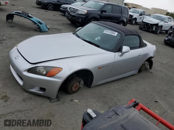 ✅ 2003 Honda S2000 • VIN: JHMAP11433T002429 • Lot: 81412054. Listed on Copart with 199,678 mi. Free auction sales archive from the USA and detailed vehicle history report at DreamBid. Image 1.