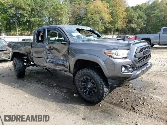 ✅ 2017 Toyota Tacoma SR5 • VIN: 5TFSZ5AN4HX100790 • Lot: 86988525. Listed on Copart with 152,850 mi. Free auction sales archive from the USA and detailed vehicle history report at DreamBid. Image 13.