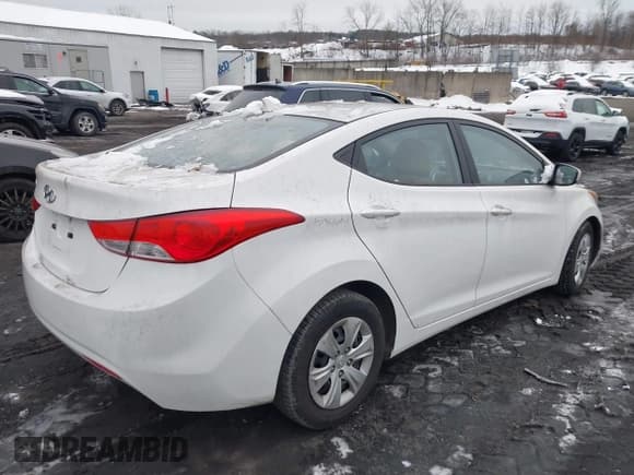 ✅ 2012 Hyundai Elantra GLS • VIN: 5NPDH4AE2CH144717 • Lot: 43829757. Listed on IAAI with 69,070 mi. Free auction sales archive from the USA and detailed vehicle history report at DreamBid. Image 4.