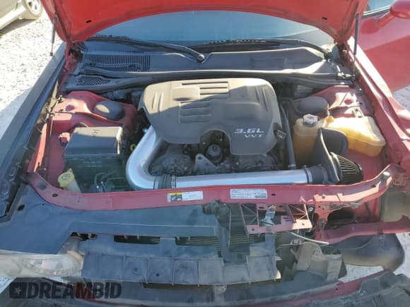 ✅ 2013 Dodge Challenger SXT • VIN: 2C3CDYAG4DH569628 • Lot: 72761454. Wystawiony na Copart z przebiegiem 115 590 mil. Bezpłatny archiwum sprzedaży aukcyjnych z USA i szczegółowy raport historii pojazdu na DreamBid. Zdjęcie 11.