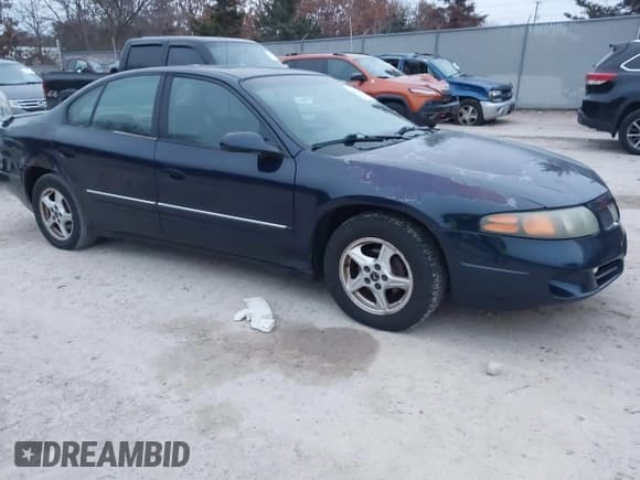 ✅ 2002 Pontiac Bonneville SE • VIN: 1G2HX54K924136229 • Lot: 41061953. Wystawiony na IAAI z przebiegiem 259 595 mil. Bezpłatny archiwum sprzedaży aukcyjnych z USA i szczegółowy raport historii pojazdu na DreamBid. Zdjęcie 1.