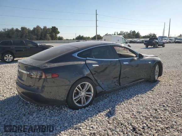 ✅ 2015 Tesla Model S 85D • VIN: 5YJSA1E20FF110997 • Lot: 82544995. Listed on Copart with 80,055 mi. Free auction sales archive from the USA and detailed vehicle history report at DreamBid. Image 3.