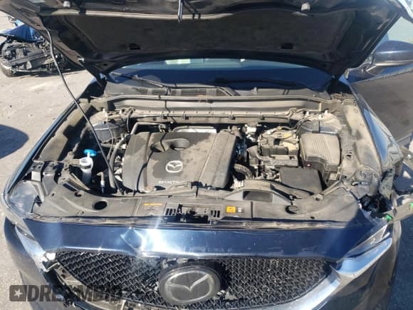 ✅ 2021 Mazda CX-5 Touring • VIN: JM3KFACM5M1354857 • Lot: 89668295. Wystawiony na Copart z przebiegiem 55 797 mil. Bezpłatny archiwum sprzedaży aukcyjnych z USA i szczegółowy raport historii pojazdu na DreamBid. Zdjęcie 12.