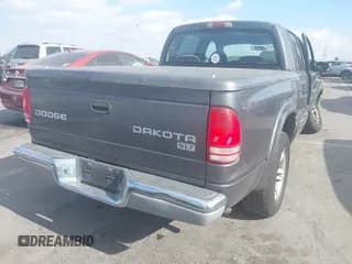 ✅ 2003 Dodge Dakota SLT • VIN: 1D7HL48N23S247441 • Lot: 41359296. Wystawiony na IAAI z przebiegiem 58 414 mil. Bezpłatny archiwum sprzedaży aukcyjnych z USA i szczegółowy raport historii pojazdu na DreamBid. Zdjęcie 4.