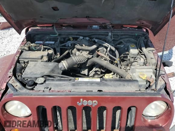 ✅ 2009 Jeep Wrangler Unlimited Sahara • VIN: 1J4GA59149L704745 • Lot: 80519045. Listed on Copart with 152,442 mi. Free auction sales archive from the USA and detailed vehicle history report at DreamBid. Image 12.