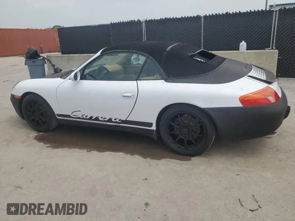 ✅ 1999 Porsche 911 • VIN: WP0CA2993XS651127 • Lot: 59631795. Listed on Copart with 99,103 mi. Free auction sales archive from the USA and detailed vehicle history report at DreamBid. Image 2.