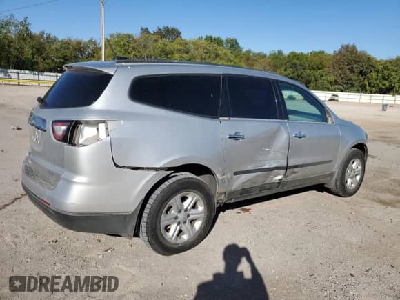 2017 Chevrolet Traverse LS with VIN 1GNKRFED7HJ145823, listed as a Copart auction lot 82596235 with 163,057 mi miles and Salvage title. Bid and sale history available at DreamBid. Image 3.