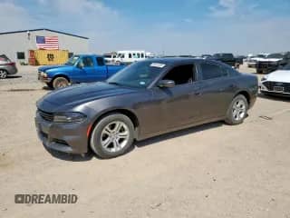 2020 Dodge Charger SXT with VIN 2C3CDXBG7LH214038, listed as a Copart auction lot 69014205 with 98,520 mi miles and Clean title. Bid and sale history available at DreamBid. Image 1.