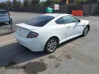 ✅ 2007 Hyundai Tiburon GS • VIN: KMHHM66D47U254751 • Лот: 43124714. Опубликован ранее на IAAI с пробегом 206 292 миль. Бесплатный доступ к архиву аукционных продаж из США и подробный отчёт об истории автомобиля на DreamBid. Изображение 4.