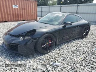 ✅ 2018 Porsche 911 Carrera • VIN: WP0AA2A95JS105701 • Лот: 55452615. Опубликован ранее на Copart с пробегом 49 190 миль. Бесплатный доступ к архиву аукционных продаж из США и подробный отчёт об истории автомобиля на DreamBid. Изображение 1.