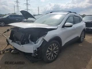 ✅ 2020 Ford Escape Titanium • VIN: 1FMCU9J94LUB09170 • Lot: 67720025. Wystawiony na Copart z przebiegiem 61 928 mil. Bezpłatny archiwum sprzedaży aukcyjnych z USA i szczegółowy raport historii pojazdu na DreamBid. Zdjęcie 1.