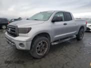 ✅ 2010 Toyota Tundra • VIN: 5TFRM5F10AX005751 • Lot: 82445975. Listed on Copart with 326,740 mi. Free auction sales archive from the USA and detailed vehicle history report at DreamBid. Image 1.