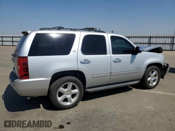2013 Chevrolet Tahoe LTZ z VIN 1GNSKCE02DR373305, wystawiony jako Copart lot #80902065 z przebiegiem 268 880 mil mil oraz Szkoda całkowita • Salvage title. Historia ofert i sprzedaży dostępna na DreamBid. Obrazek 3.