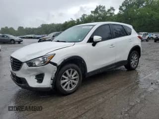 ✅ 2016 Mazda CX-5 Sport • VIN: JM3KE4BY2G0727663 • Лот: 65738665. Опубликован ранее на Copart с пробегом 168 094 миль. Бесплатный доступ к архиву аукционных продаж из США и подробный отчёт об истории автомобиля на DreamBid. Изображение 1.