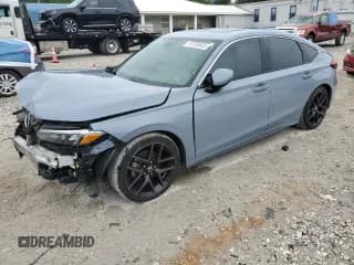 ✅ 2023 Honda Civic Sport Touring • VIN: 19XFL1H81PE015934 • Lot: 70708835. Listed on Copart with 32,412 mi. Free auction sales archive from the USA and detailed vehicle history report at DreamBid. Image 1.