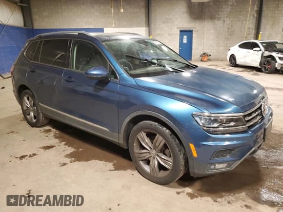 ✅ 2018 Volkswagen Tiguan SEL Premium • VIN: 3VV5B7AX7JM004230 • Lot: 90241115. Listed on Copart with 74,734 mi. Free auction sales archive from the USA and detailed vehicle history report at DreamBid. Image 4.