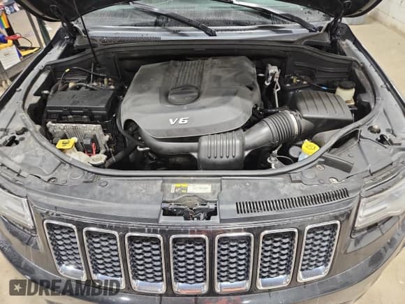 ✅ 2014 Jeep Grand Cherokee Overland • VIN: 1C4RJFCG9EC339863 • Lot: 90741315. Listed on Copart with 143,485 mi. Free auction sales archive from the USA and detailed vehicle history report at DreamBid. Image 12.