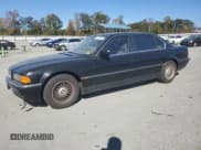 ✅ 1997 BMW 7 Series 740iL • VIN: WBAGJ832XVDM00233 • Lot: 87192565. Listed on Copart with 281,000 mi. Free auction sales archive from the USA and detailed vehicle history report at DreamBid. Image 1.