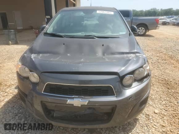 2012 Chevrolet Sonic LT z VIN 1G1JC5SB3C4216292, wystawiony jako Copart lot #57061465 z przebiegiem 56 675 mil mil oraz Szkoda całkowita • Salvage title. Historia ofert i sprzedaży dostępna na DreamBid. Obrazek 5.