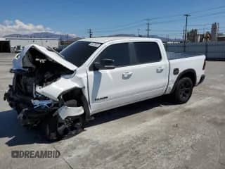 2021 Ram 1500 Rebel z VIN 1C6SRFLT0MN538169, wystawiony jako Copart lot #80576935 z przebiegiem 129 462 mil mil oraz Szkoda całkowita • Salvage title. Historia ofert i sprzedaży dostępna na DreamBid. Obrazek 1.
