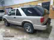 2003 Chevrolet Blazer LS с VIN 1GNCS18X13K145014, выставлен на аукционе Copart как лот 80925074 с пробегом 205 401 миль миль и Чистый • Clean title. История ставок и продаж доступна на DreamBid. Изображение 2.