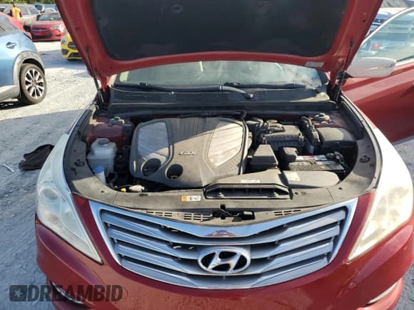 ✅ 2012 Hyundai Azera • VIN: KMHFG4JG5CA183172 • Лот: 90432795. Опубликован ранее на Copart с пробегом 82 676 миль. Бесплатный доступ к архиву аукционных продаж из США и подробный отчёт об истории автомобиля на DreamBid. Изображение 11.