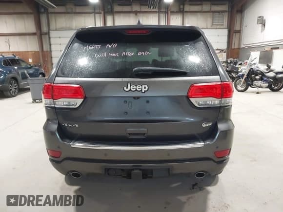 ✅ 2014 Jeep Grand Cherokee Overland • VIN: 1C4RJFCGXEC340052 • Lot: 43485667. Listed on IAAI with 113,840 mi. Free auction sales archive from the USA and detailed vehicle history report at DreamBid. Image 16.