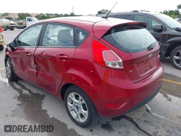 ✅ 2015 Ford Fiesta SE • VIN: 3FADP4EJ8FM125880 • Lot: 43162101. Listed on IAAI with 124,014 mi. Free auction sales archive from the USA and detailed vehicle history report at DreamBid. Image 3.