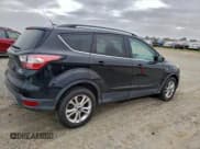 ✅ 2018 Ford Escape SE • VIN: 1FMCU0GD0JUC36969 • Lot: 94981265. Listed on Copart with 127,764 mi. Free auction sales archive from the USA and detailed vehicle history report at DreamBid. Image 3.