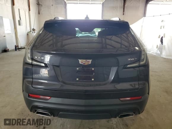 ✅ 2023 Cadillac XT4 AWD Sport • VIN: 1GYFZFR41PF103650 • Лот: 59321355. Опубликован ранее на Copart с пробегом 27 092 миль. Бесплатный доступ к архиву аукционных продаж из США и подробный отчёт об истории автомобиля на DreamBid. Изображение 6.