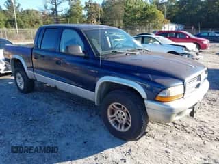 2004 Dodge Dakota SLT z VIN 1D7HG48N34S737294, wystawiony jako IAAI lot #43498525 z przebiegiem 189 980 mil mil oraz . Historia ofert i sprzedaży dostępna na DreamBid. Obrazek 1.