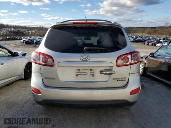 ✅ 2011 Hyundai Santa Fe Limited • VIN: 5XYZKDAG1BG044574 • Lot: 79920694. Listed on Copart with 291,582 mi. Free auction sales archive from the USA and detailed vehicle history report at DreamBid. Image 6.