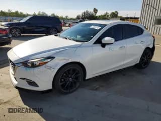 ✅ 2017 Mazda 3 Touring • VIN: JM1BN1L36H1115780 • Лот: 72012515. Опубликован ранее на Copart с пробегом 82 078 миль. Бесплатный доступ к архиву аукционных продаж из США и подробный отчёт об истории автомобиля на DreamBid. Изображение 1.