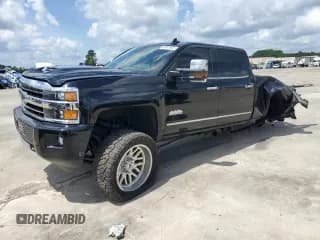 ✅ 2019 Chevrolet Silverado 2500HD High Country • VIN: 1GC1KUEY7KF277037 • Lot: 64945955. Listed on Copart with 71,249 mi. Free auction sales archive from the USA and detailed vehicle history report at DreamBid. Image 1.