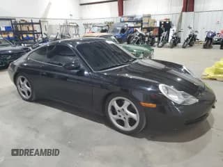 ✅ 1999 Porsche 911 • VIN: WP0AA2994XS625367 • Lot: 84816015. Wystawiony na Copart z przebiegiem 71 329 mil. Bezpłatny archiwum sprzedaży aukcyjnych z USA i szczegółowy raport historii pojazdu na DreamBid. Zdjęcie 4.