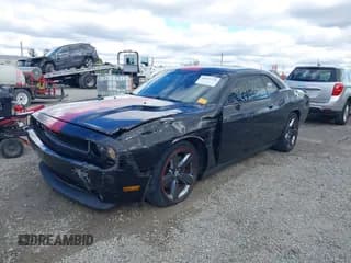 ✅ 2013 Dodge Challenger SXT • VIN: 2C3CDYAG2DH724886 • Lot: 43515778. Listed on IAAI with 104,828 mi. Free auction sales archive from the USA and detailed vehicle history report at DreamBid. Image 2.
