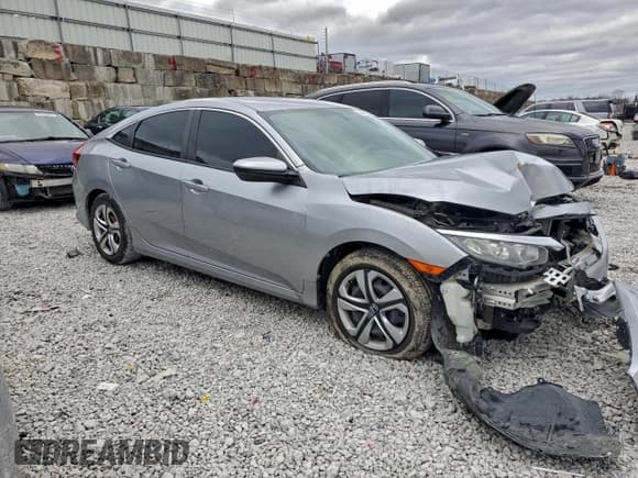 ✅ 2018 Honda Civic LX • VIN: 19XFC2F5XJE027537 • Лот: 94306525. Опубликован ранее на Copart с пробегом 104 457 миль. Бесплатный доступ к архиву аукционных продаж из США и подробный отчёт об истории автомобиля на DreamBid. Изображение 4.