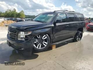 2018 Chevrolet Tahoe Premier with VIN 1GNSKCKJ9JR219814, listed as a Copart auction lot 67780075 with 88,000 mi miles and Salvage title. Bid and sale history available at DreamBid. Image 1.