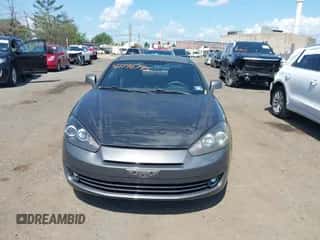 2007 Hyundai Tiburon GS с VIN KMHHM66D87U243753, выставлен на аукционе IAAI как лот 42796795 с пробегом 57 004 миль миль и . История ставок и продаж доступна на DreamBid. Изображение 6.