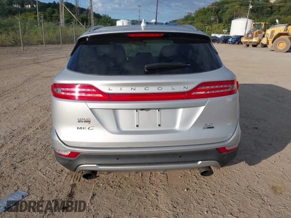 ✅ 2015 Lincoln MKC • VIN: 5LMCJ1A90FUJ47927 • Lot: 43104396. Listed on IAAI with 54,701 mi. Free auction sales archive from the USA and detailed vehicle history report at DreamBid. Image 17.