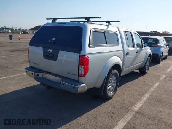 ✅ 2016 Nissan Frontier Pro-4X • VIN: 1N6AD0EV4GN771911 • Lot: 42955470. Listed on IAAI with 113,355 mi. Free auction sales archive from the USA and detailed vehicle history report at DreamBid. Image 4.