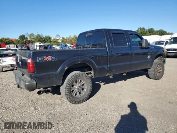 ✅ 2011 Ford F-250 Lariat • VIN: 1FT7W2BT3BED12240 • Lot: 86869825. Listed on Copart with 201,602 mi. Free auction sales archive from the USA and detailed vehicle history report at DreamBid. Image 3.